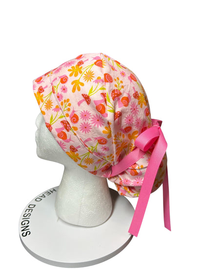 Women’s Ponytail Scrub Cap: Adjustable Cotton Scrub Hat in pink snail fabric