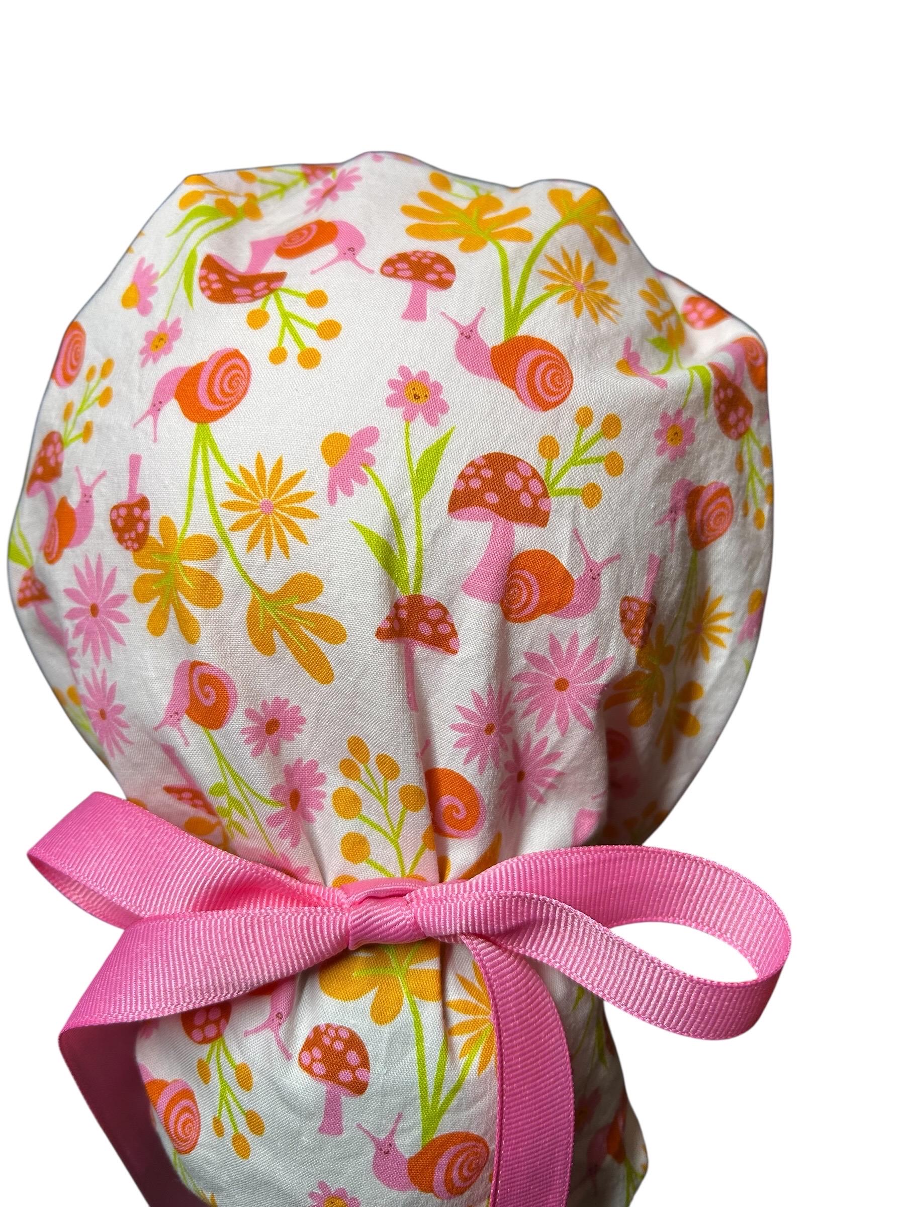 Women’s Ponytail Scrub Cap: Adjustable Cotton Scrub Hat in pink snail fabric