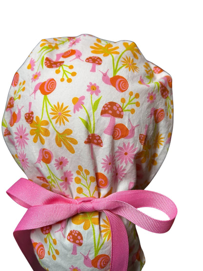 Women’s Ponytail Scrub Cap: Adjustable Cotton Scrub Hat in pink snail fabric