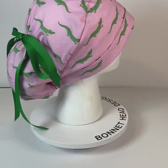 Pink and green alligators women's ponytail scrub cap, Bonnet Head Designs