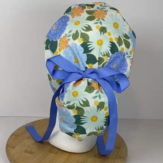 Blue floral women’s scrub cap, blue floral ponytail scrub hat