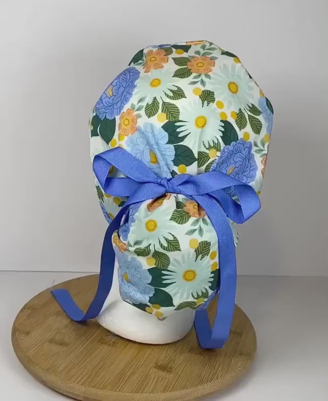 Blue floral women’s scrub cap, blue floral ponytail scrub hat