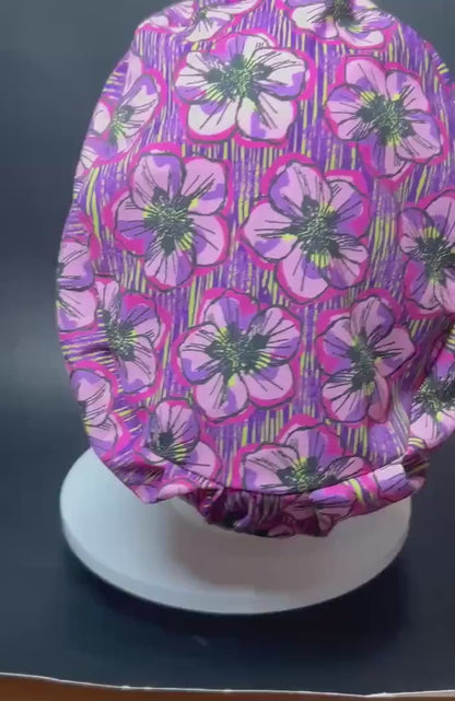 Floral Euro Scrub Cap: Purple flower print nurse hat with toggle