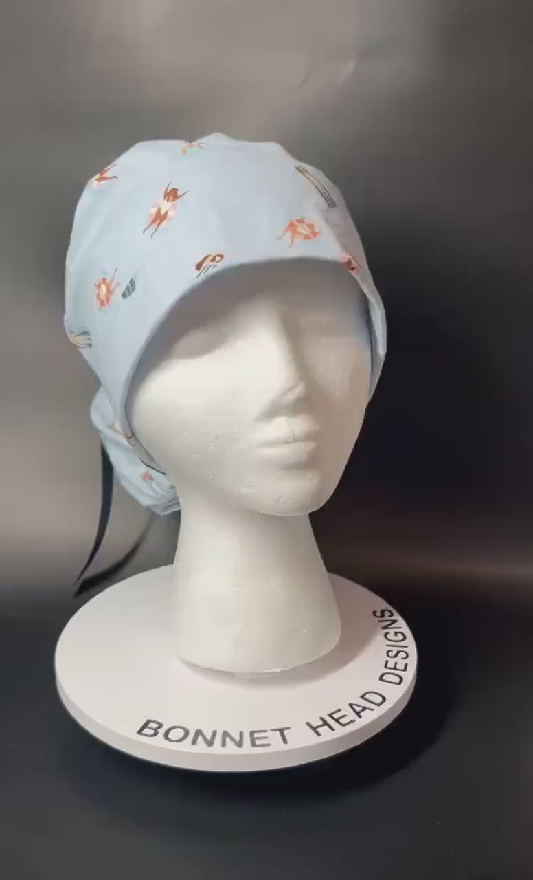Float Away Sunshine Story ponytail scrub cap, blue summer swim print adjustable pocket ponytail scrub hat