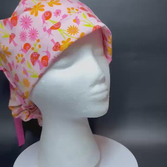 Women’s Ponytail Scrub Cap: Adjustable Cotton Scrub Hat in pink snail fabric