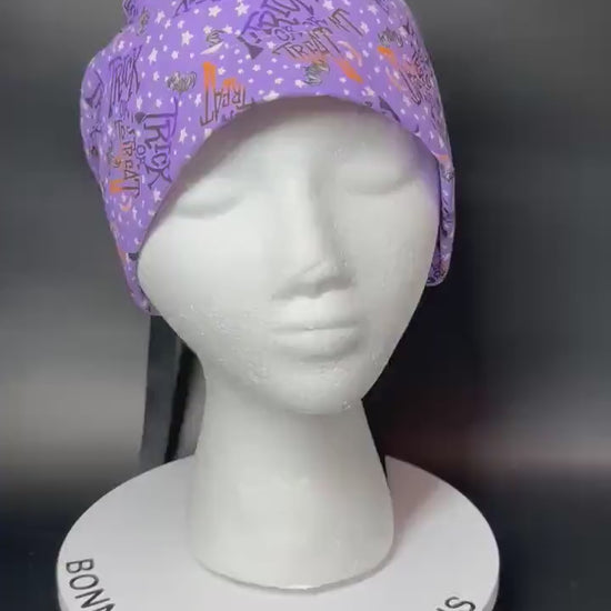 Ponytail Scrub Cap: Women's Halloween nurse hat, purple trick or treat fabric