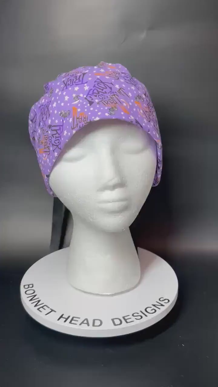 Ponytail Scrub Cap: Women's Halloween nurse hat, purple trick or treat fabric