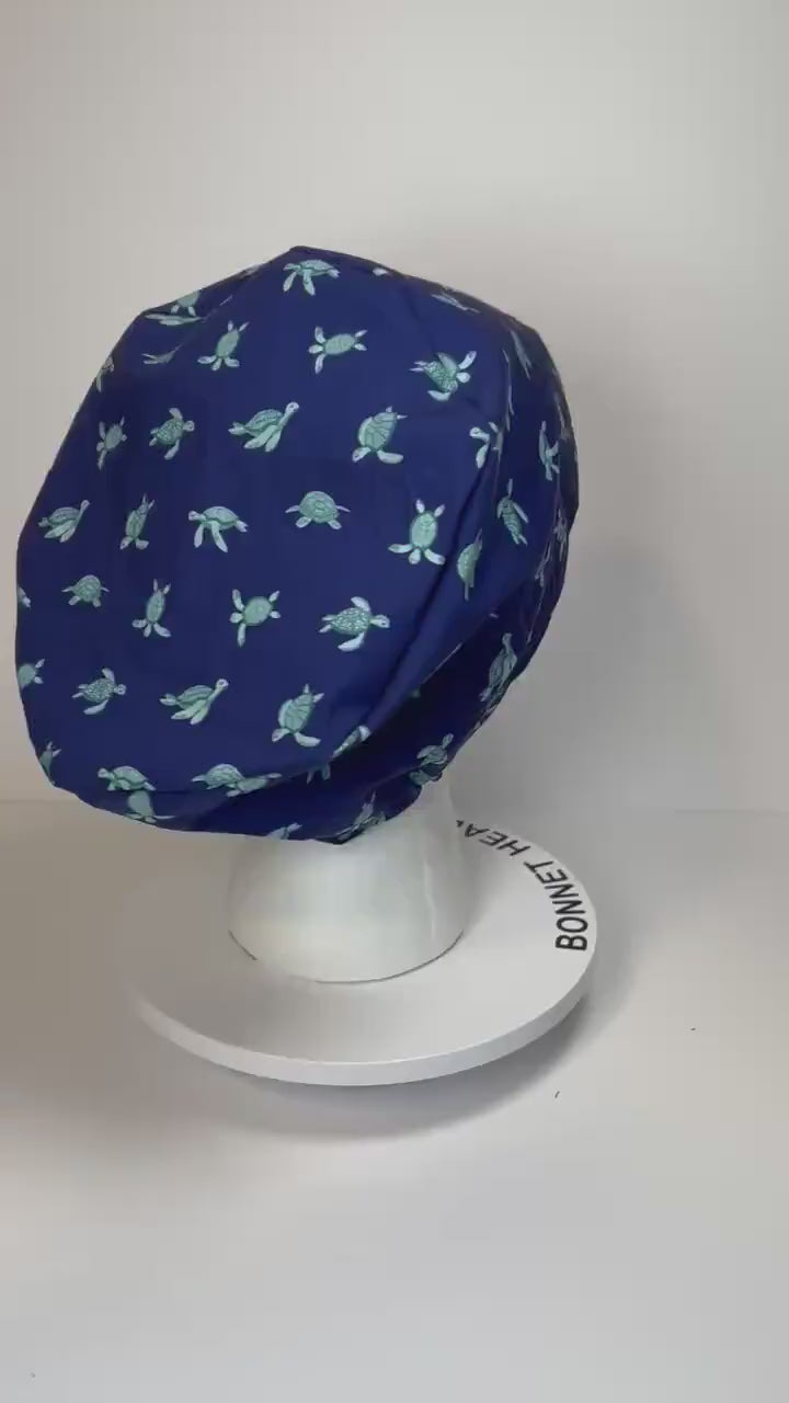 Navy Sea turtle euro style scrub cap, women’s turtle print scrub cap with toggle, Bonnet Head Designs