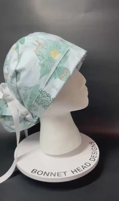 Forest Fable in Seagram ponytail scrub cap, women’s forest print scrub hat with cinch ties and satin lining option