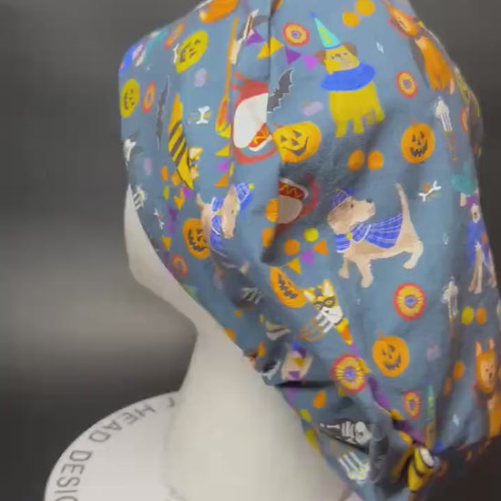 Euro scrub cap with toggle: Howl-ween fabric, dogs in costume