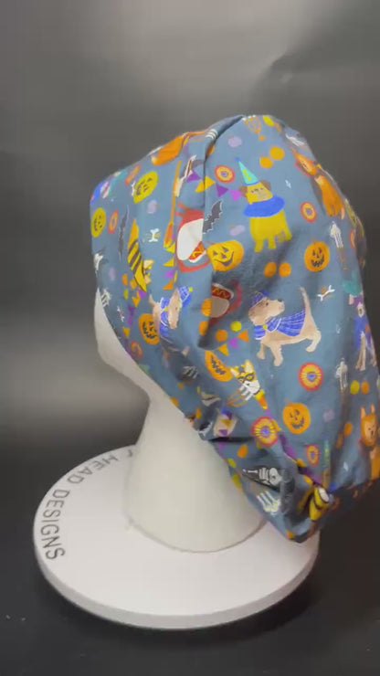 Euro scrub cap with toggle: Howl-ween fabric, dogs in costume